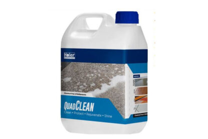 Holer Quad clean NZ Grinders A large white bottle of floor cleaner called quad clean with a blue logo