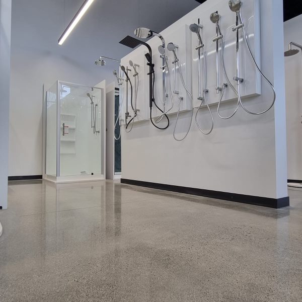 Harrison bloy showroom polished concrete floor grind Bathroom Showroom polished concrete floor Tauranga NZ Grinders