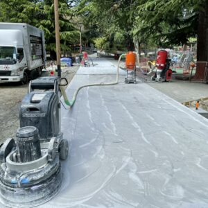 Queenstown lake front path surface non-slip Queenstown lakefront path being completed by workers