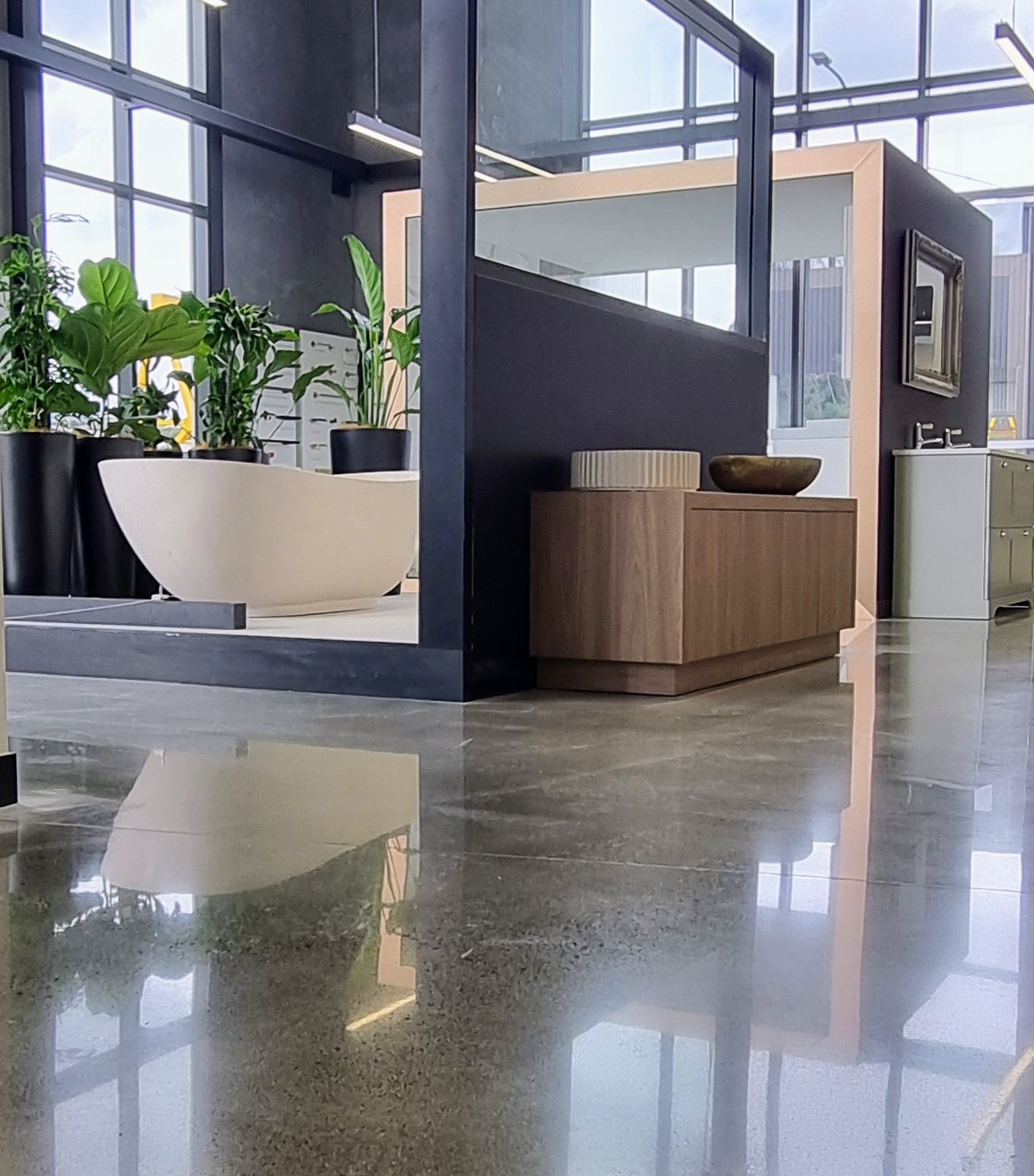 salt and pepper polished Floor grinding Harrison Bloy Tauranga NZ Grinders Salt and pepper diamond polished floor harrison bloy retail showroom