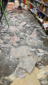 tile uplift Tile Uplift being completed in a supermarket