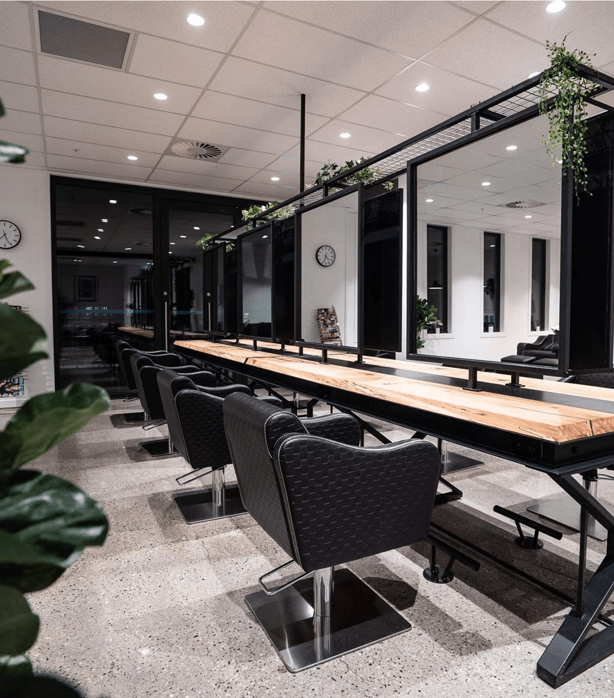 commercial office polished concrete floor nz grinders tauranga taupo polished concrete floor with table in centre of the room and black padded leather chairs around it