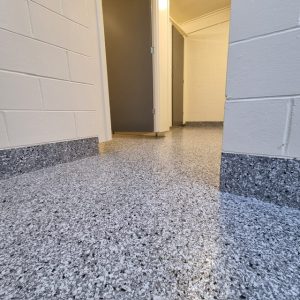 flake-epoxy-flooring-coving-nz-toilets Flake flooring at the historic village toilets tauranga with coving up the walls