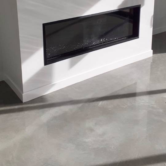 Marble Exposure polished concrete NZ Grinders Warehouse Tauranga 1 (2) Marble Exposure polished concrete NZ Grinders Warehouse Tauranga Lounge fireplace