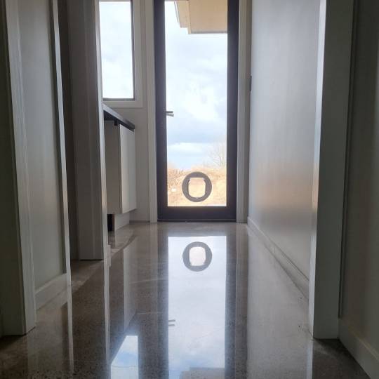 salt and pepper finish for a beach house polished concrete floor nz grinders tauranga2 (1) Salt and pepper finish for a beach house polished concrete floor nz grinders tauranga hallway