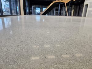 5. after different view Power trowel floor NZ Grinders Tauranga Auckland Damaged concrete floor after